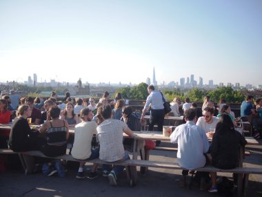 Busy summer viewpoint of London's skyline clipart