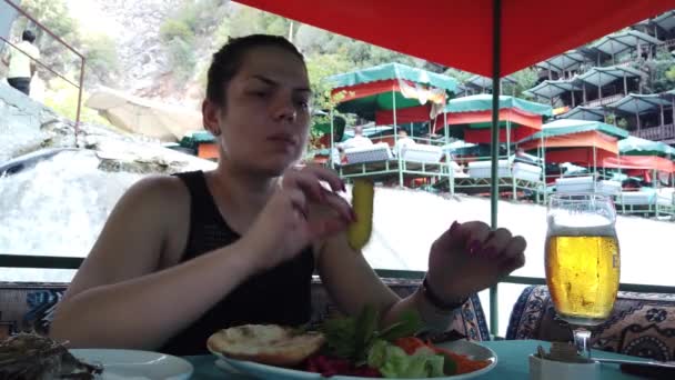 Girl Dines Restaurant Water Small Waterfall Mountain River — Stock Video