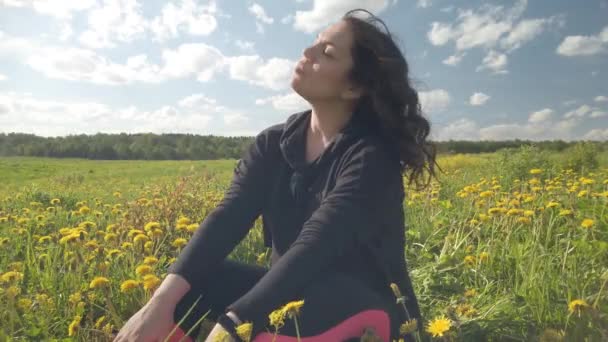 Girl Sits Spring Meadow Overgrown Flowering Dandelions Portrait Woman Selects — Stock Video