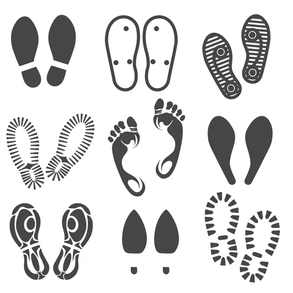 Ślad stopy i buty drukuje zestaw — Wektor stockowy