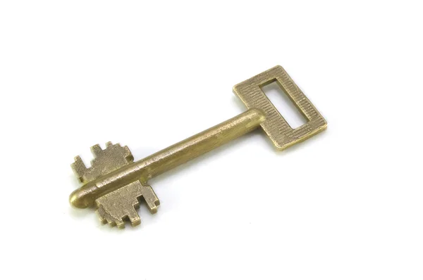 Ancient key on a white background close up, key, bronze, old times, freedom