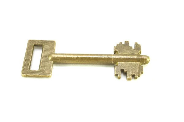 Ancient key on a white background close up, key, bronze, old times, freedom
