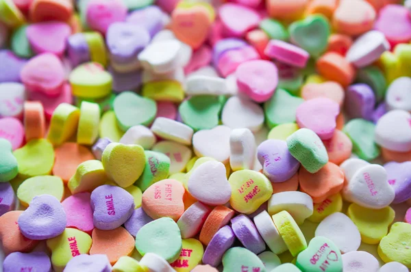 Closeup of heart candies with message