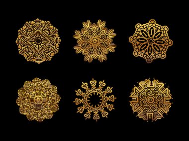 Siyah arkaplanda altın mandala