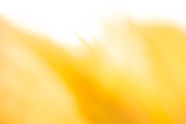 Altın sarısı ballı şeker rengi dalga etkisi soyut arkaplan. Bulanık, tatlı, ballı arkaplan. 