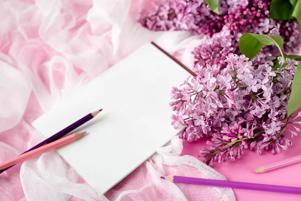 lilac flowers and white place for text . greeting card.