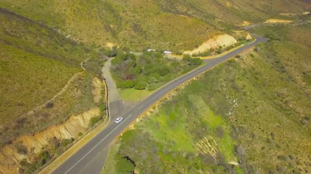 Chapmans Peak Drive 4K UHD metraje aéreo de paso de carretera de montaña. Ciudad del Cabo Sudáfrica. Parte 2 de 5 — Vídeos de Stock