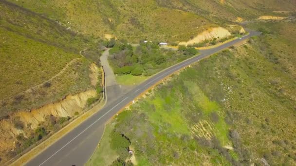 Chapmans Peak Drive 4K UHD metraje aéreo de paso de carretera de montaña. Ciudad del Cabo Sudáfrica. Parte 3 de 5 — Vídeos de Stock