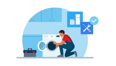 Profesyonel bir tamirci çamaşır makinesini tamir ediyor.