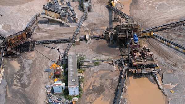 Canadian landscape of rare earth mining site. Critical rare earth minerals used for technology, weapon and electric vehicles. Concept of industry, nature, and environmental impact.