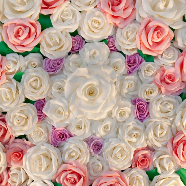 Background Texture of Artificial Rose. Rose buds made from plastic