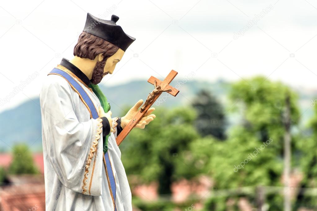 The catholic church and statue of of Radna, Romania