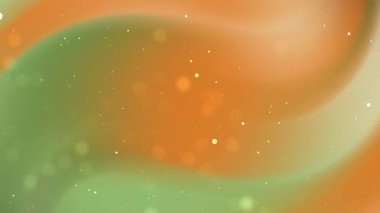 Abstract orange and green swirling colors with bokeh lights suitable for background designs, artistic concepts, and visual content creation.