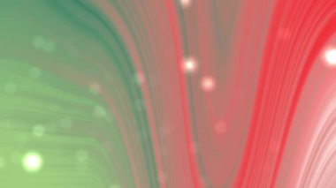 Bulanık bokeh efektleriyle harmanlanmış yeşil ve kırmızı renkler modern estetik arkaplan veya tasarım projeleri için uygundur..