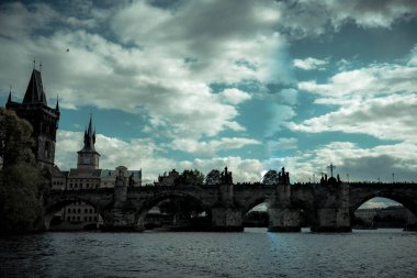 Charles Bridge is a historic stone bridge over the Vltava River in Prague