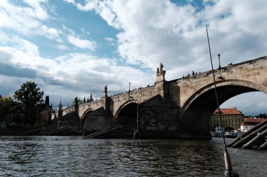Charles Bridge is a historic stone bridge over the Vltava River in Prague