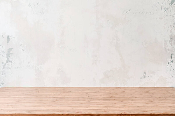 Empty wooden table with grunge cement or concrete wall texture background