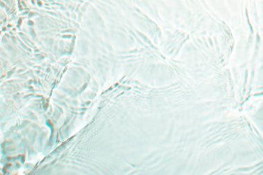 Yumuşak odaklı beyaz dalgalı soyut su dalgalanması dokusu arkaplanı