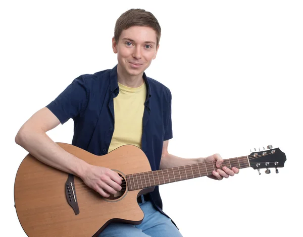 Onun gitar çalmak müzisyen. 