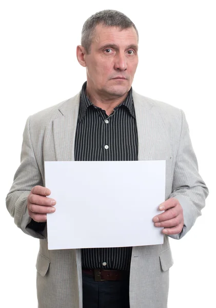 Businessman holding a white sheet in hands Stock Image