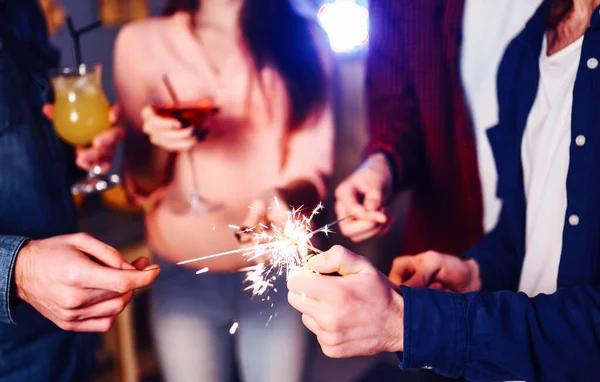 Christmas Sparkles Hands Crowd Young Happy People Sparklers Hands Celebration — Stock Photo, Image