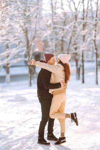 Happy Couple Hugging Kissing Outdoors Winter Park Young Man Woman — Stock Photo, Image