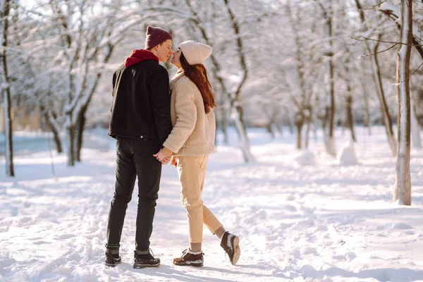 Happy Couple Hugging Kissing Outdoors Winter Park Young Man Woman — Stock Photo, Image