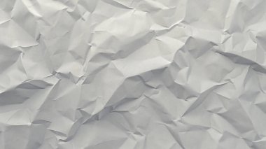 Görünür kırışıklıkları ve nötr tonu olan gerçekçi buruşmuş kağıt.