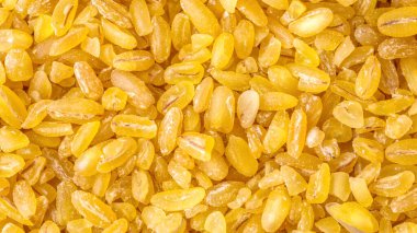 bulgur buğday arka planı. bulgur buğday dokusu. en üstteki görünüm