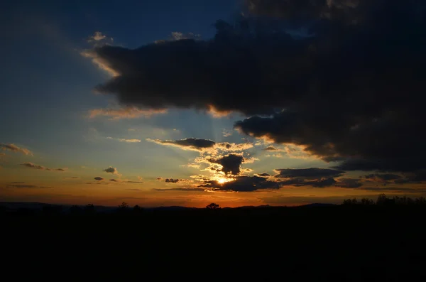 Puesta de sol con nubes —  Fotos de Stock