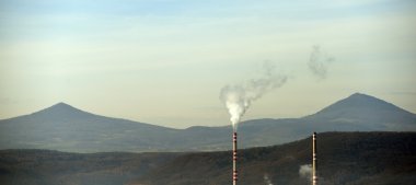 Factories with smokestacks clipart