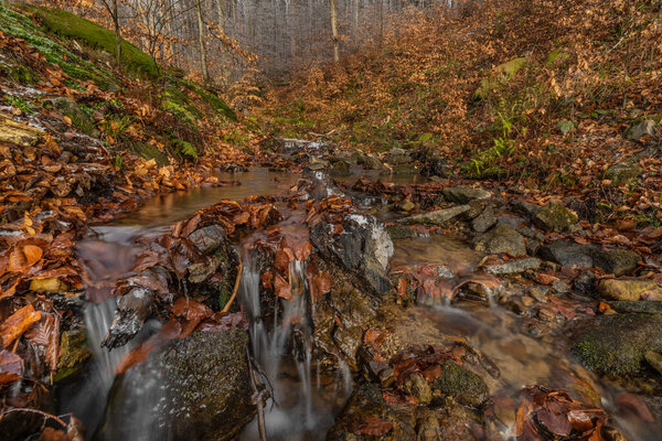Waterfall under Cernava in east Moravia region in autumn winter cold color day