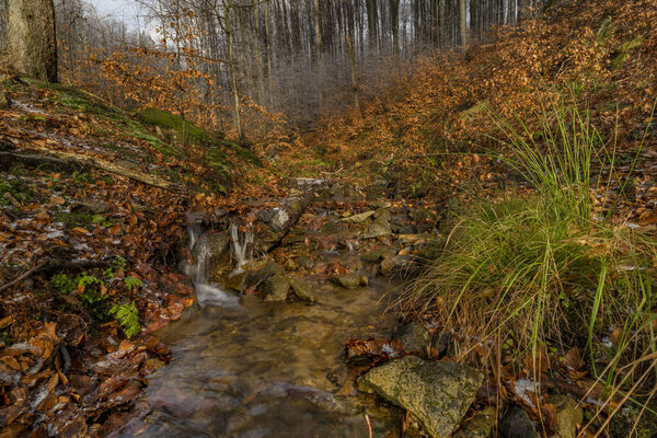 Waterfall under Cernava in east Moravia region in autumn winter cold color day