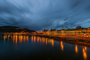 Night with orange lights in valley of river Labe near Usti nad Labem city in north Bohemia clipart