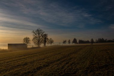 Road near Borek part of town with color winter sunrise near city Ceske Budejovice CZ 12 09 2025