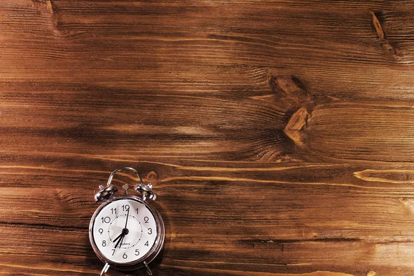 Watch on wooden background — Stock Photo, Image