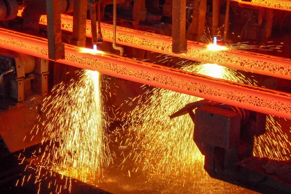 Steel billets at torch cutting Stock Image