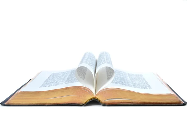 Full bible with heart forming from the open pages — Stock Photo, Image