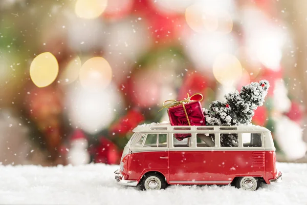 Minibus toy, tree and Christmas gift