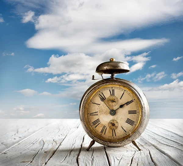 Alarm clock on table — Stock Photo, Image