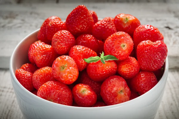 Strawberries in a white bowl — Stock Photo, Image