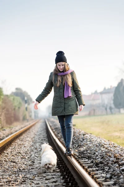 Teen girl with her dog — Stock Photo, Image