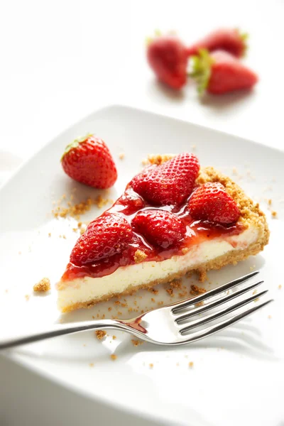 Bit av Cheesecake med jordgubbar — Stockfoto