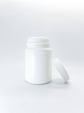 This versatile white container mockup on isolated white background with a removable lid stand beside is perfect for various storage and packaging needs