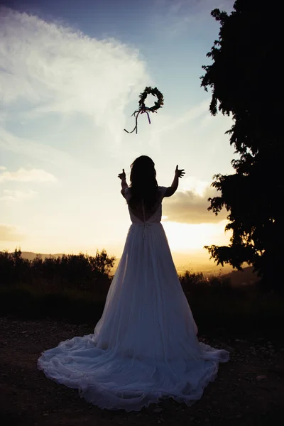 Bride at sunset, in nature — Stock Photo, Image