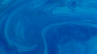 Soyut Renkli Boya Mürekkebi Patlaması Psikedelik Patlama Hareketi. yumuşak renkler, soyut kompozisyon. Mavi mermer zemin ile akrilik dokusu 