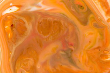 Arka plan olarak kullanmak için akrilik karışımının yakın plan soyut rengi. Mermer desenli akrilik doku, kahverengi ve turuncu mermer arka plan