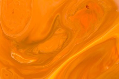 Arka plan olarak kullanmak için akrilik karışımının yakın plan soyut rengi. Mermer desenli akrilik doku, kahverengi ve turuncu mermer arka plan