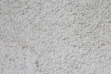 Beyaz boyalı eski duvar dokusu soyulmuş, kapalı desen soyut eski duvar arkaplanı, beton zemin. 