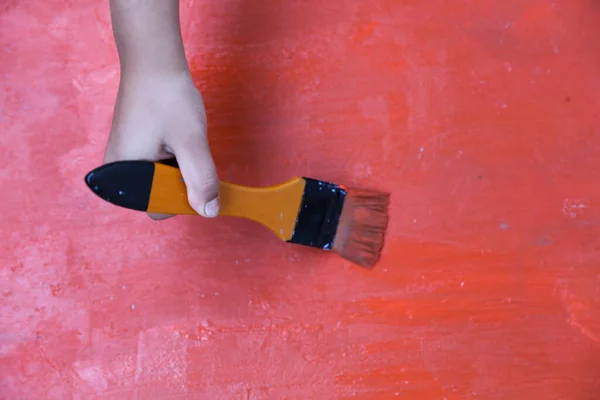 Staining Wooden Surface Red Paint Using Paint Orange Brush — Stock Photo, Image